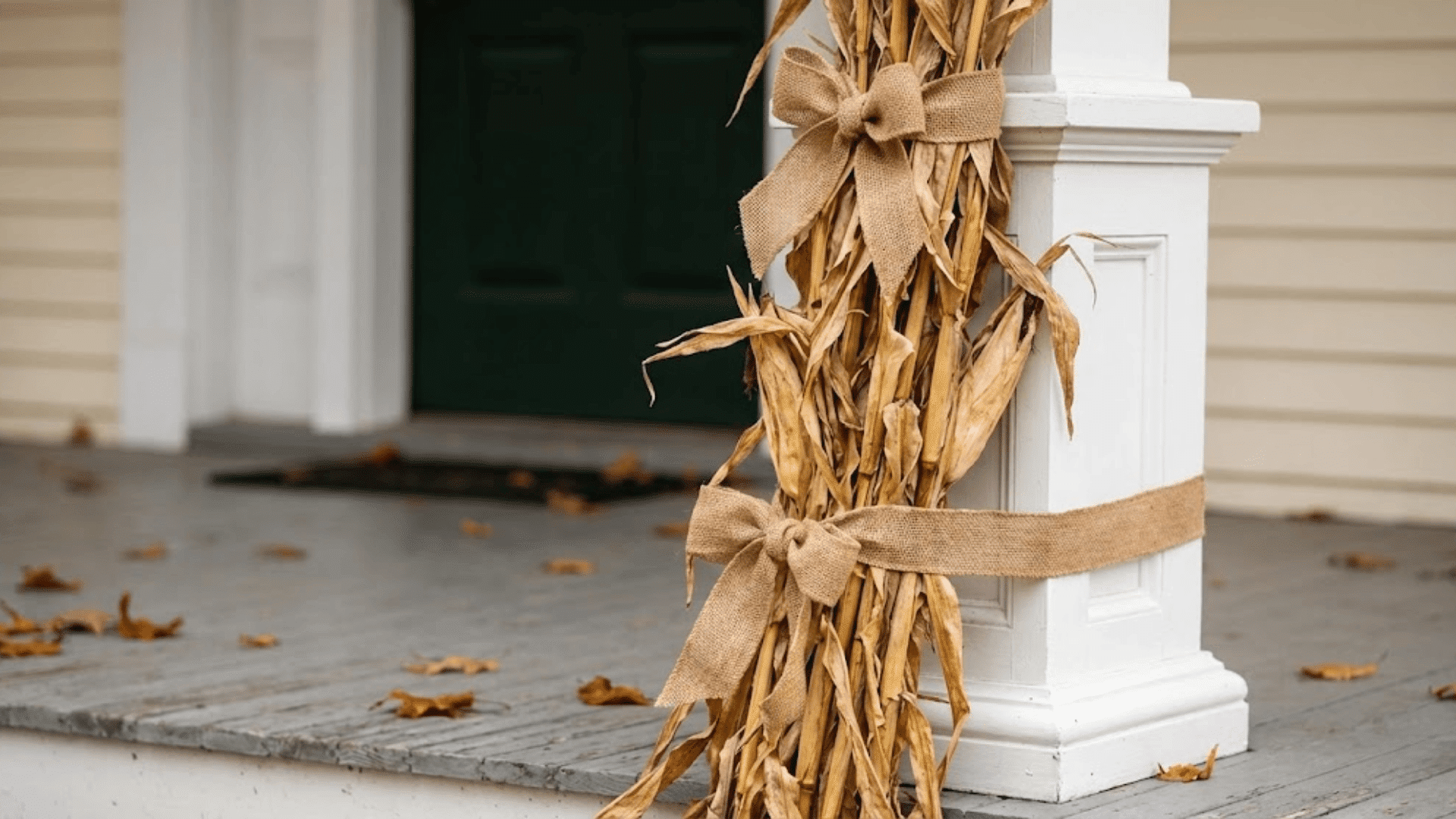 corn stalks tied to railings or columns