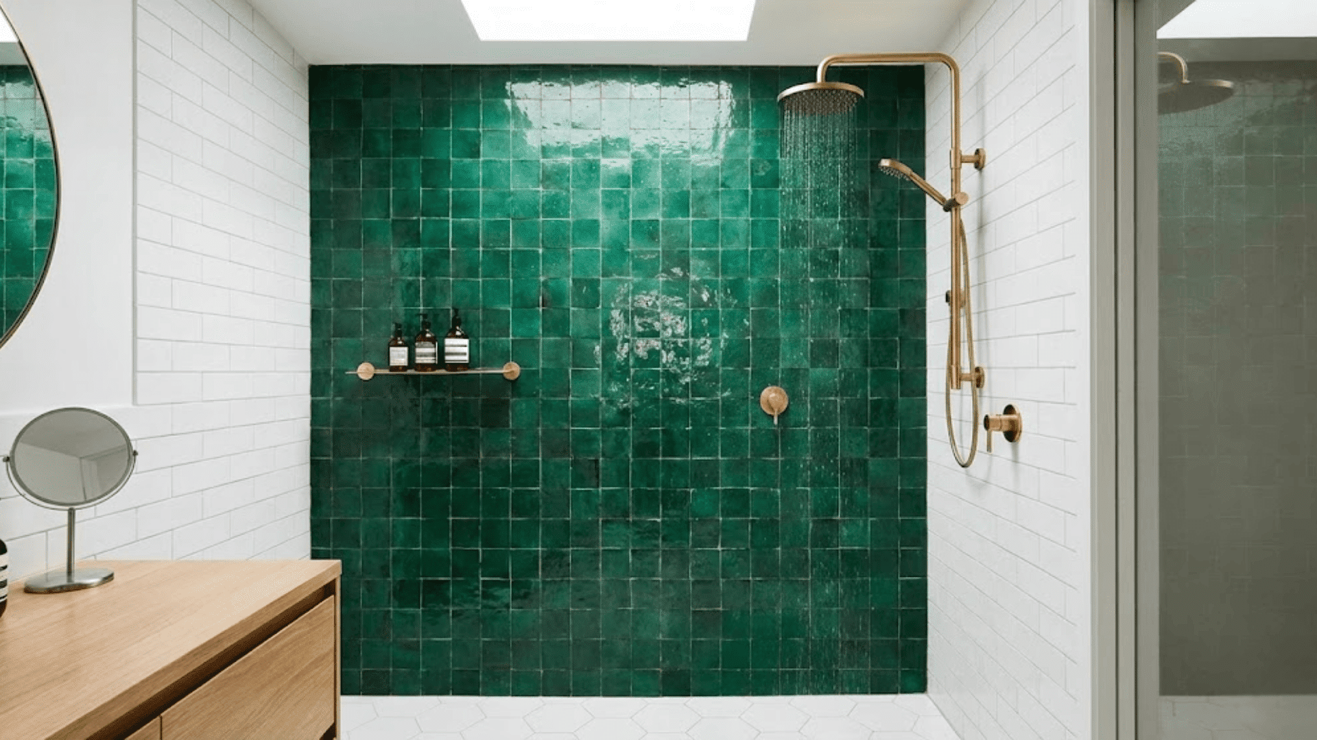 bold doorless shower featuring emerald green moroccan zellige statement tiles and brass fixtures