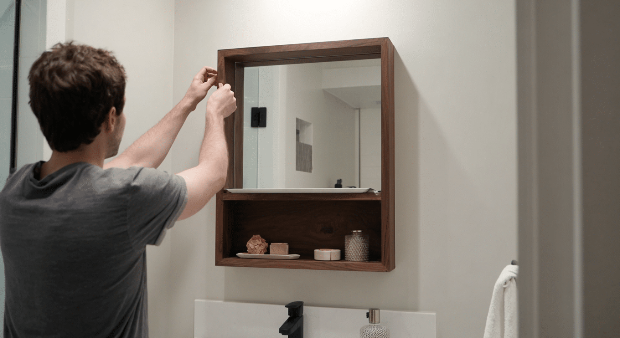 frame the mirror or hang a stylish new one