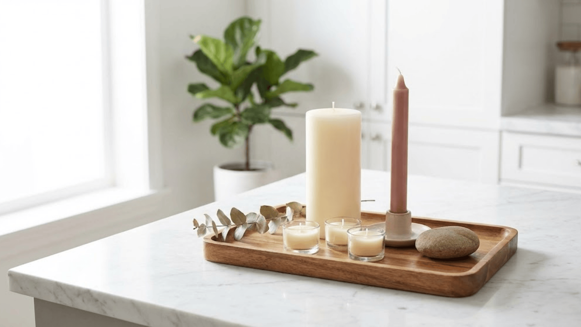 layered candle clusters on trays or shelves