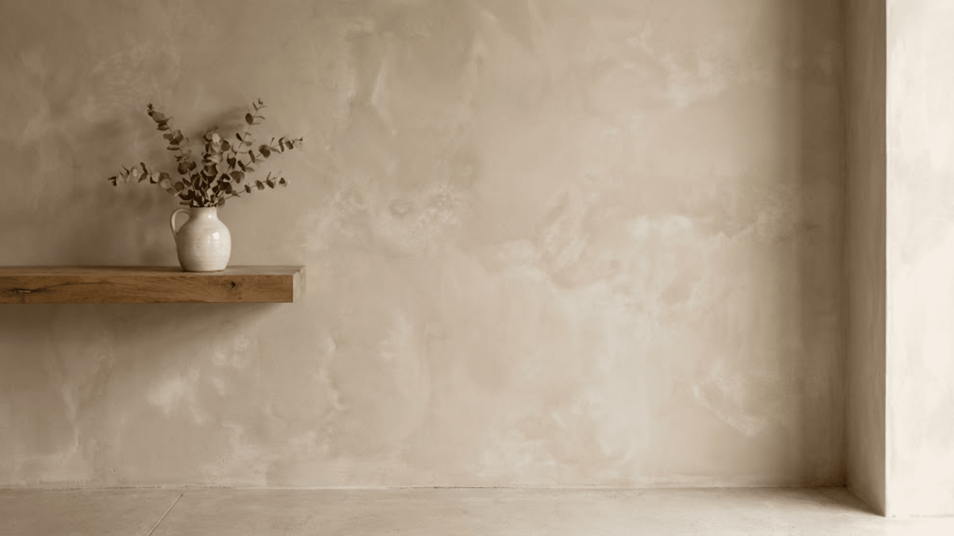 limewash paint finish in clay beige showing organic texture and subtle tonal variations on wall