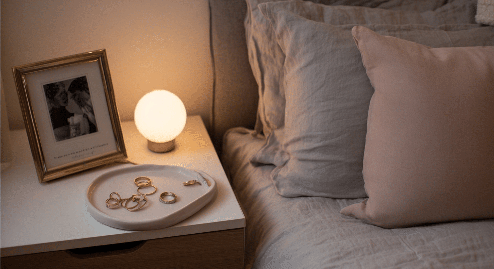 bedroom nightstand decor with soft restful lighting
