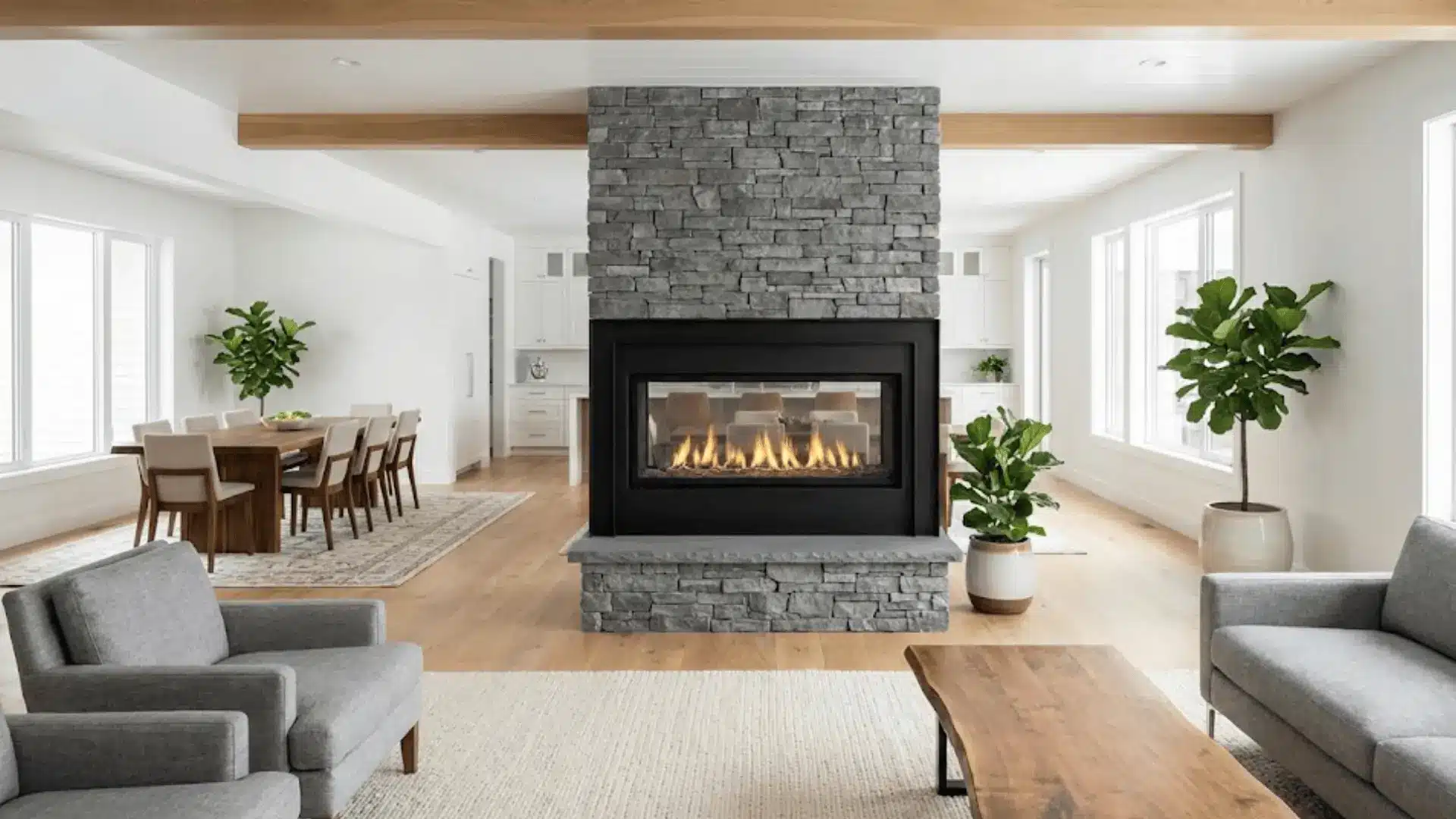 double-sided fireplace anchoring living and dining areas in open floor plan