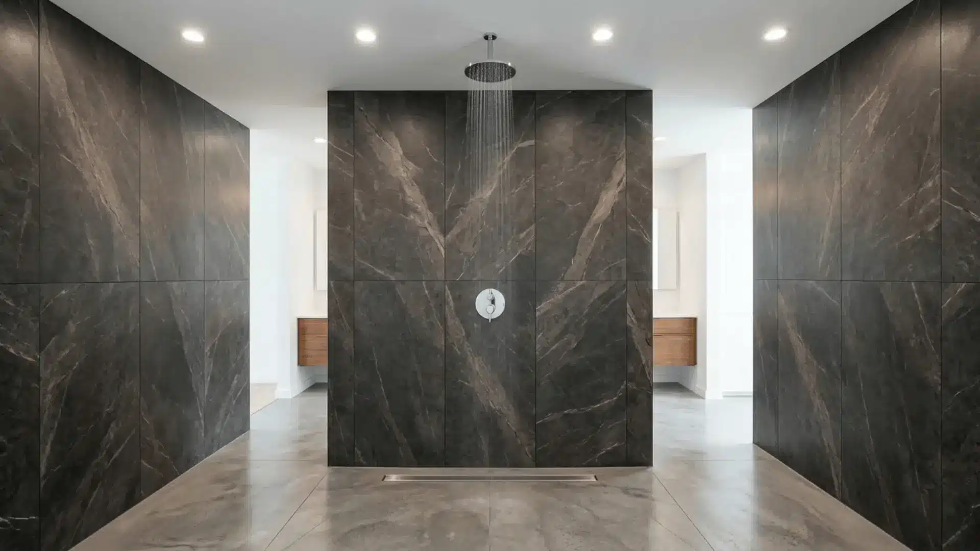floor-to-ceiling charcoal porcelain tile shower with linear drain and chrome fixtures
