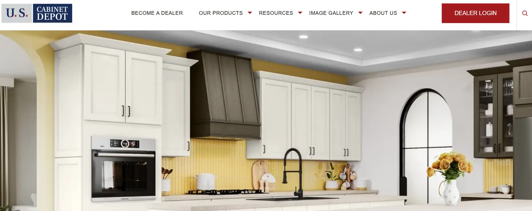 Modern kitchen with white cabinets, black range hood, yellow backsplash, and floral vase on counter