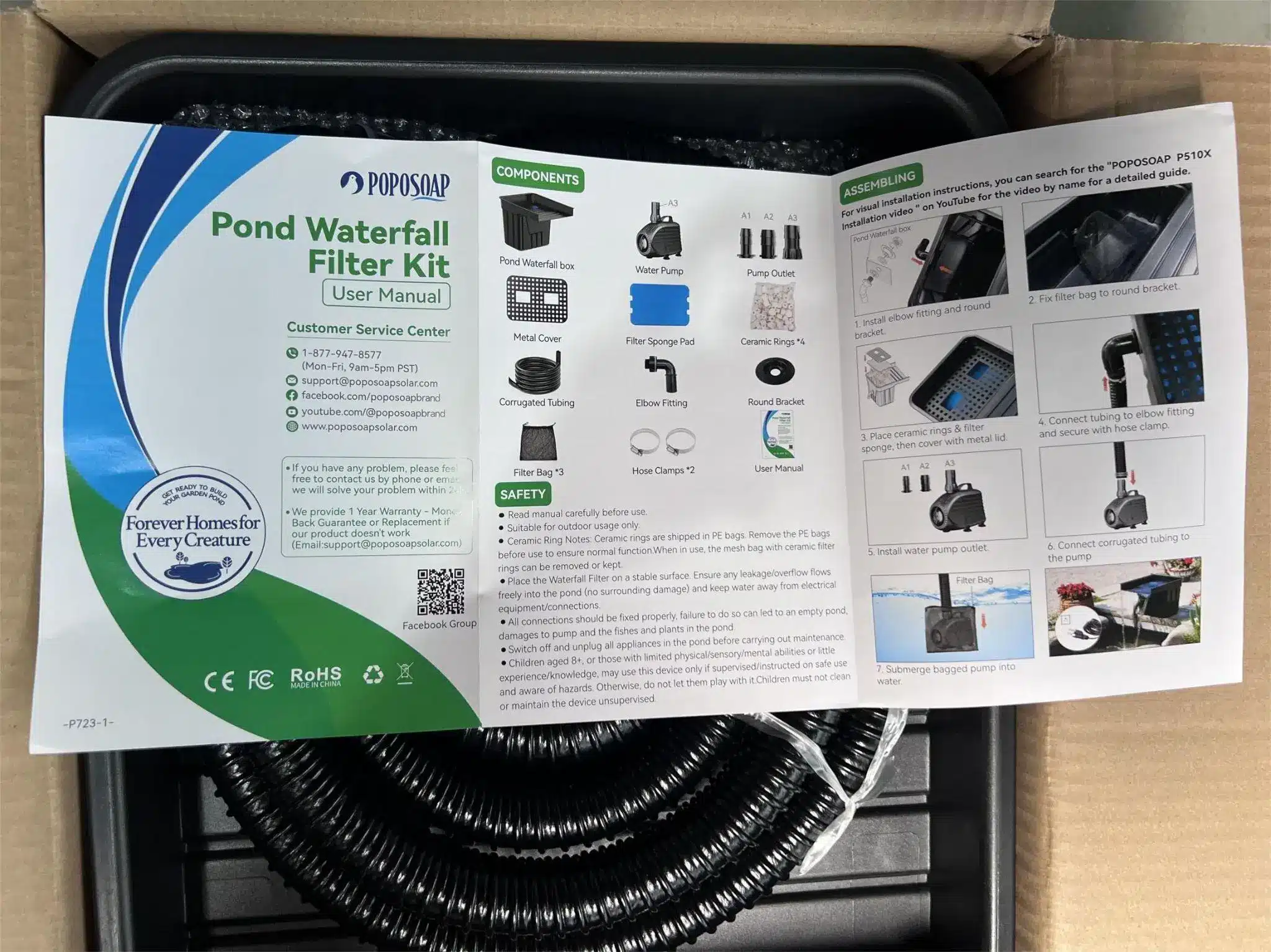 Pond waterfall filter kit manual spread open above packaged components in cardboard box