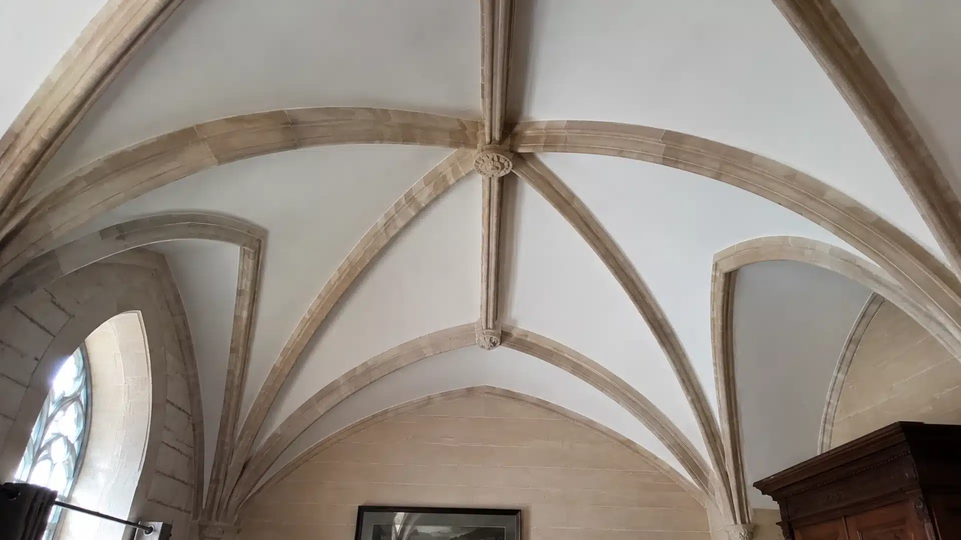 rib vault ceiling with arched intersecting ribs in a gothic style interior