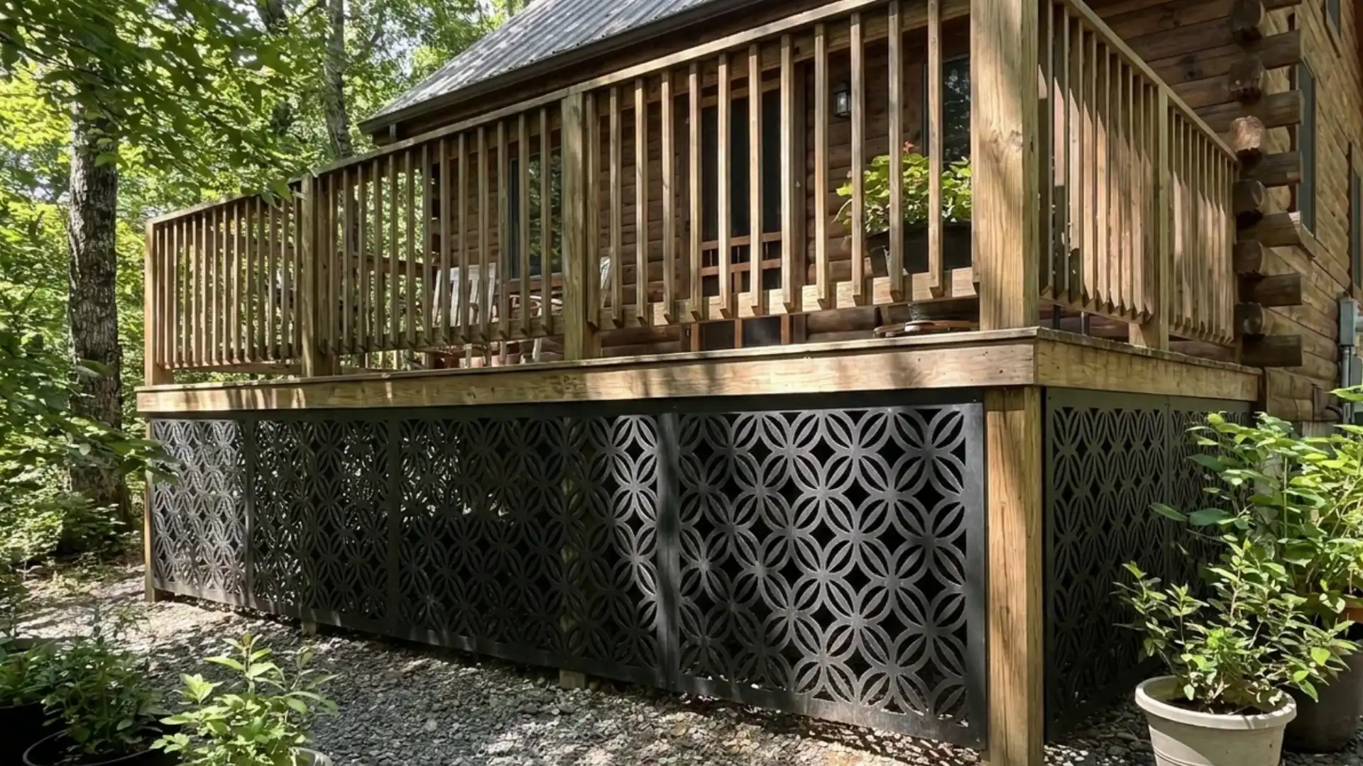 decorative geometric cutout panels as deck skirting on wooded log cabin