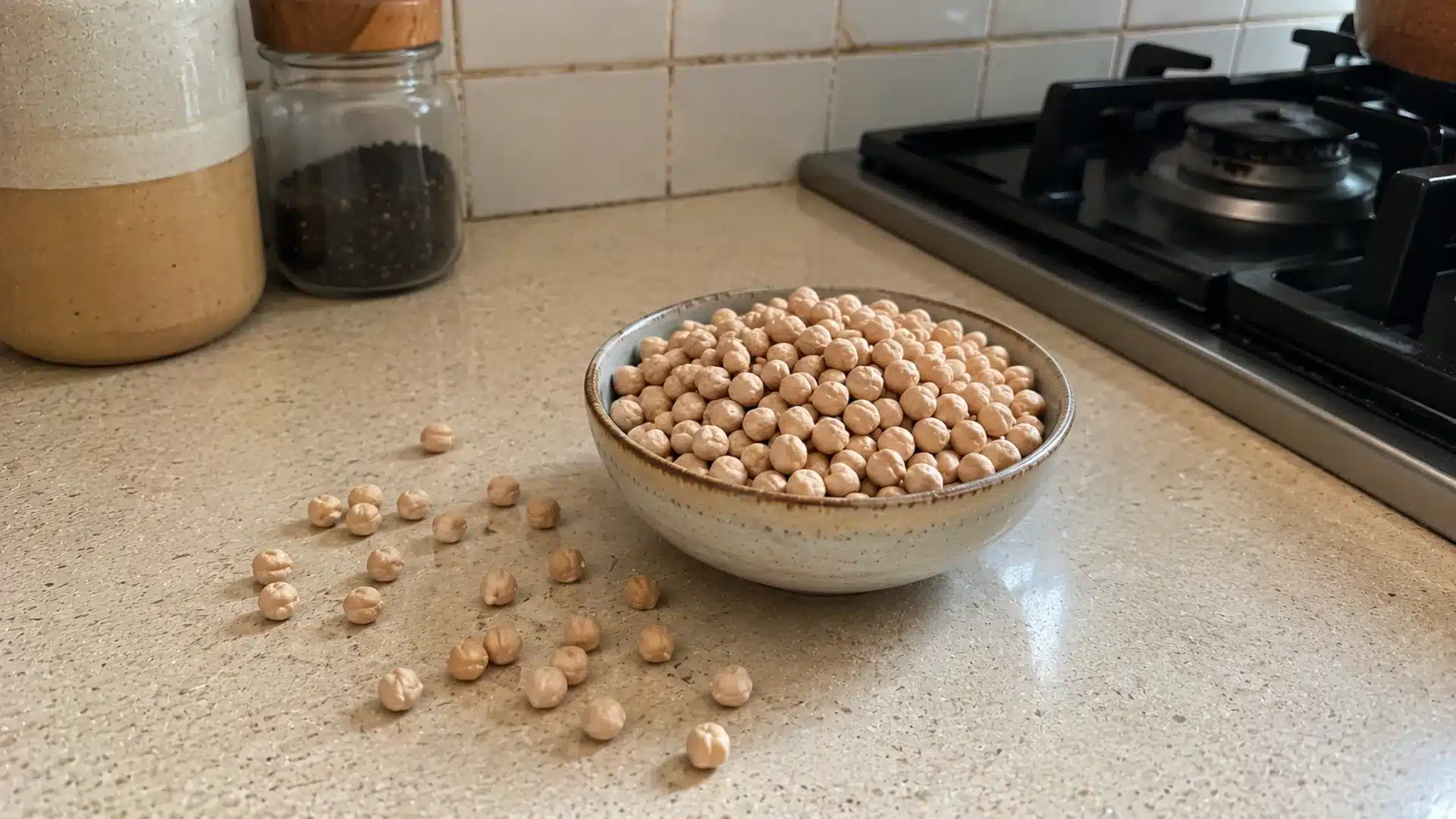 dry chickpeas (garbanzo beans) in a bowl on a kitchen countertop